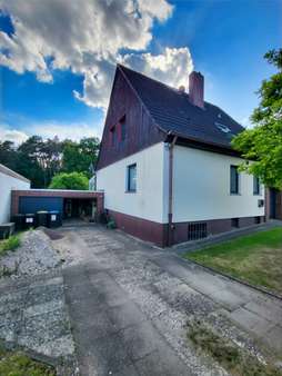 Außenansicht / Zufahrt Garage Außenansicht / Zufahrt Garage - Einfamilienhaus in 29313 Hambühren mit 126m² kaufen