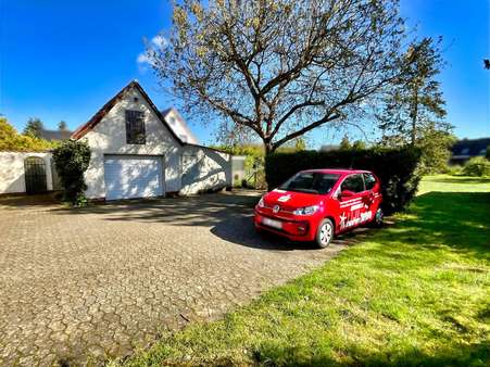 Ansicht Stellplätze und Garage - Einfamilienhaus in 38518 Gifhorn mit 140m² kaufen