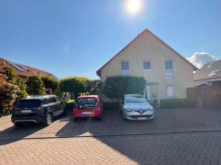 Strassenansicht - Reihenmittelhaus in 38448 Wolfsburg mit 81m² kaufen