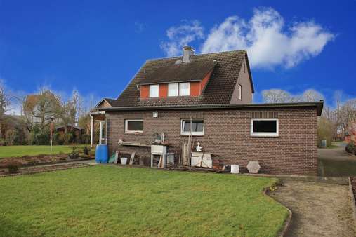 Gartenansicht 1 - Zweifamilienhaus in 29356 Bröckel mit 153m² günstig kaufen