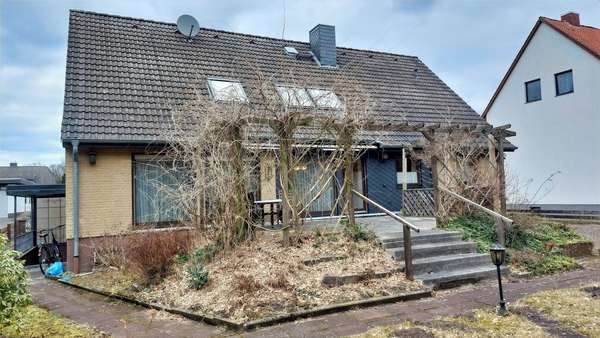 Blick auf die Terrasse - Zweifamilienhaus in 29345 Unterlüß mit 210m² kaufen