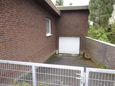 Garagenzufahrt im Keller - Einfamilienhaus in 26683 Saterland mit 178m² kaufen