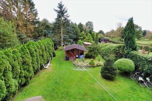 Ausblick in den Garten - Zweifamilienhaus in 26160 Bad Zwischenahn mit 168m² kaufen