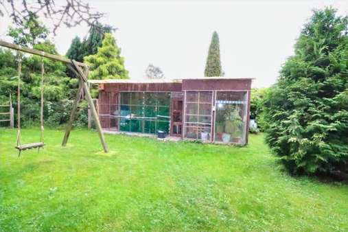 Garten mit Vogelvoliere - Zweifamilienhaus in 26160 Bad Zwischenahn mit 168m² kaufen