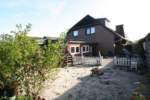 Außenansicht / Garten - Einfamilienhaus in 26215 Wiefelstede mit 234m² kaufen