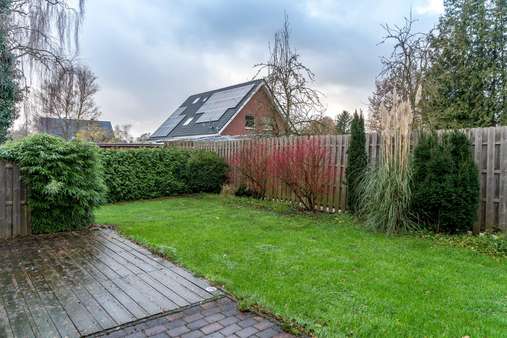 Blick in den Garten - Einfamilienhaus in 26655 Westerstede mit 141m² kaufen