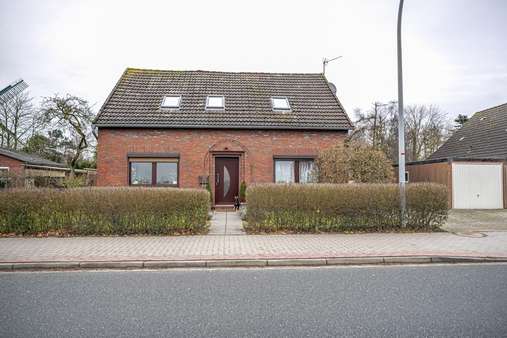 Außenansicht - Einfamilienhaus in 26937 Stadland mit 163m² kaufen