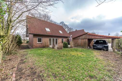 Außenansicht / Garten - Einfamilienhaus in 26215 Wiefelstede mit 158m² kaufen