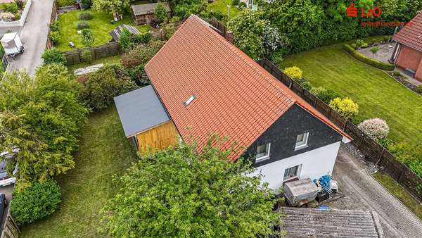 Luftaufnahme Luftaufnahme - Einfamilienhaus in 26345 Bockhorn mit 217m² kaufen