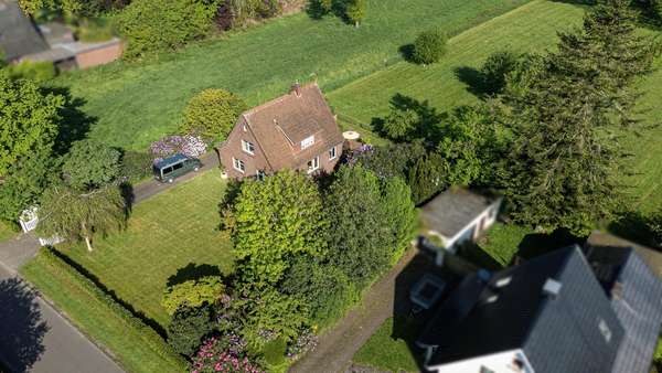 Drohnenansicht - Einfamilienhaus in 26160 Bad Zwischenahn mit 100m² kaufen