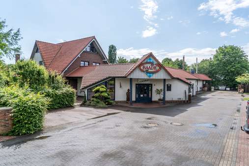 Eingang Gewerbeflächen - Einfamilienhaus in 26215 Wiefelstede mit 179m² kaufen