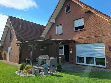 Gartenansicht - Zweifamilienhaus in 49692 Cappeln mit 183m² kaufen