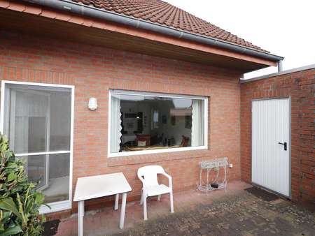 Terrasse mit Zugang zur Garage - Doppelhaushälfte in 26676 Barßel mit 112m² kaufen