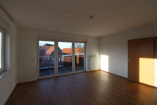 Wohnzimmer - Penthouse-Wohnung in 26203 Wardenburg mit 85m² günstig kaufen