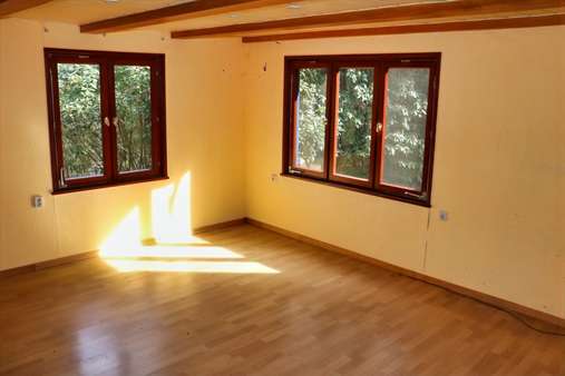 Wohnzimmer - Haus in 27793 Wildeshausen mit 53m² günstig kaufen