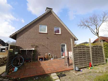 Seiteneingang mit Terrasse - Einfamilienhaus in 26683 Saterland mit 124m² günstig kaufen