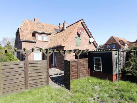 Blick aus dem Garten - Doppelhaushälfte in 26169 Friesoythe mit 99m² günstig kaufen