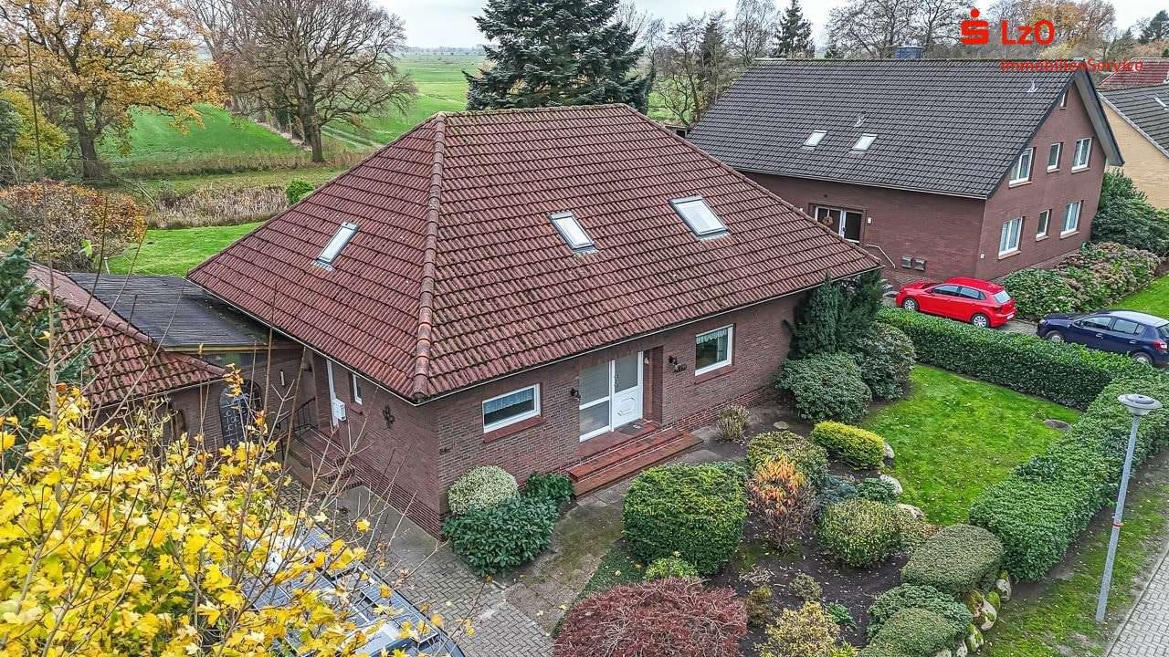 Luftaufnahme Luftaufnahme - Einfamilienhaus in 26419 Schortens mit 176m² kaufen