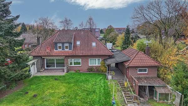 Luftaufnahme Luftaufnahme - Einfamilienhaus in 26419 Schortens mit 176m² kaufen