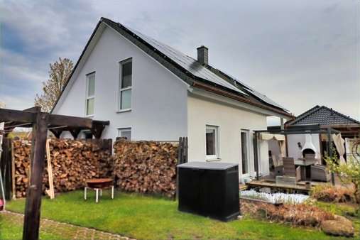 Außenansicht Seite - Einfamilienhaus in 26188 Edewecht mit 123m² kaufen