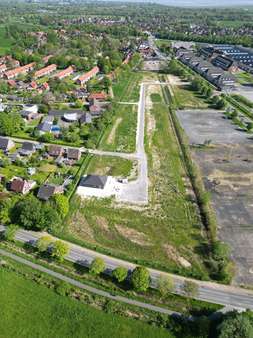 Drohnenaufnahmen Baugebiet Roffhausen - Grundstück in 26419 Schortens mit 865m² kaufen