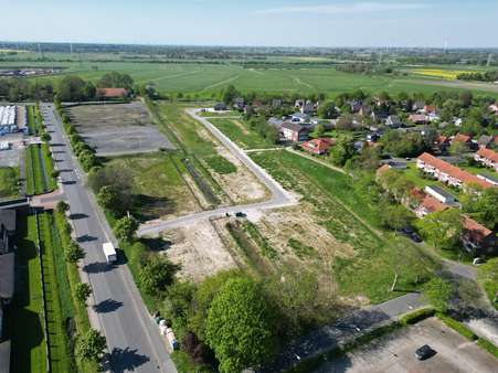 Drohnenaufnahmen Baugebiet Roffhausen - Grundstück in 26419 Schortens mit 865m² kaufen