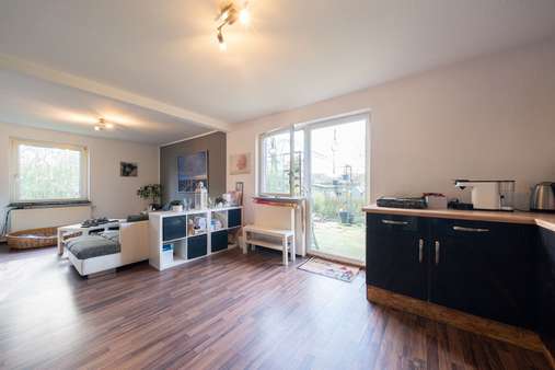 Wohn-/Esszimmer mit offener Küche - Einfamilienhaus in 26434 Wangerland mit 158m² günstig kaufen