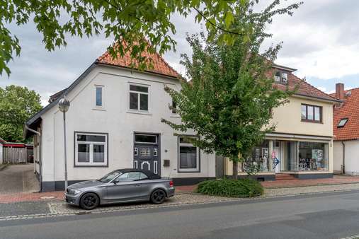 Straßenansicht - Mehrfamilienhaus in 27243 Harpstedt mit 303m² kaufen