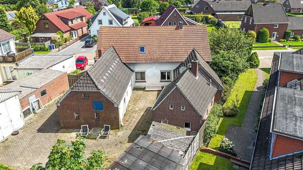 Luftaufnahme - Einfamilienhaus in 26340 Zetel mit 122m² kaufen