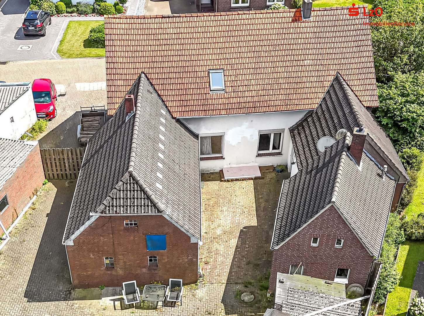 Luftaufnahme - Einfamilienhaus in 26340 Zetel mit 122m² kaufen
