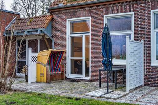 Außenansicht / Terrasse - Erdgeschosswohnung in 26409 Wittmund mit 43m² kaufen