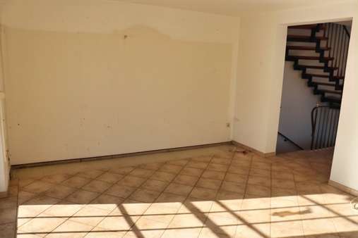 Wohnzimmer - Doppelhaushälfte in 27777 Ganderkesee mit 92m² kaufen