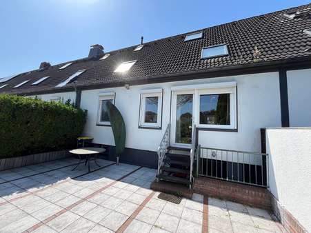 Die Terrasse ist ein zusätzliches Frischluftzimmer Die Terrasse ist ein zusätzliches Frischluftzimmer - Reihenmittelhaus in 26388 Wilhelmshaven mit 135m² kaufen