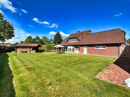 Gartenansicht Gartenansicht - Einfamilienhaus in 26632 Ihlow mit 165m² kaufen