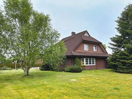 Seitenansicht - Einfamilienhaus in 26632 Ihlow mit 165m² kaufen