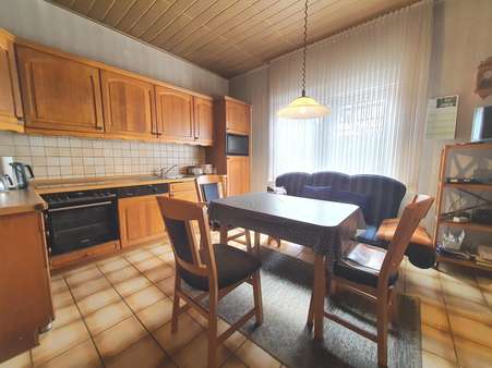 Küche mit Terrassenzugang - Einfamilienhaus in 26607 Aurich mit 157m² kaufen