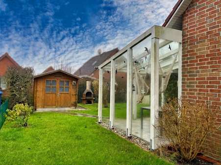 Blick in den Garten - Doppelhaushälfte in 26553 Dornum mit 60m² kaufen