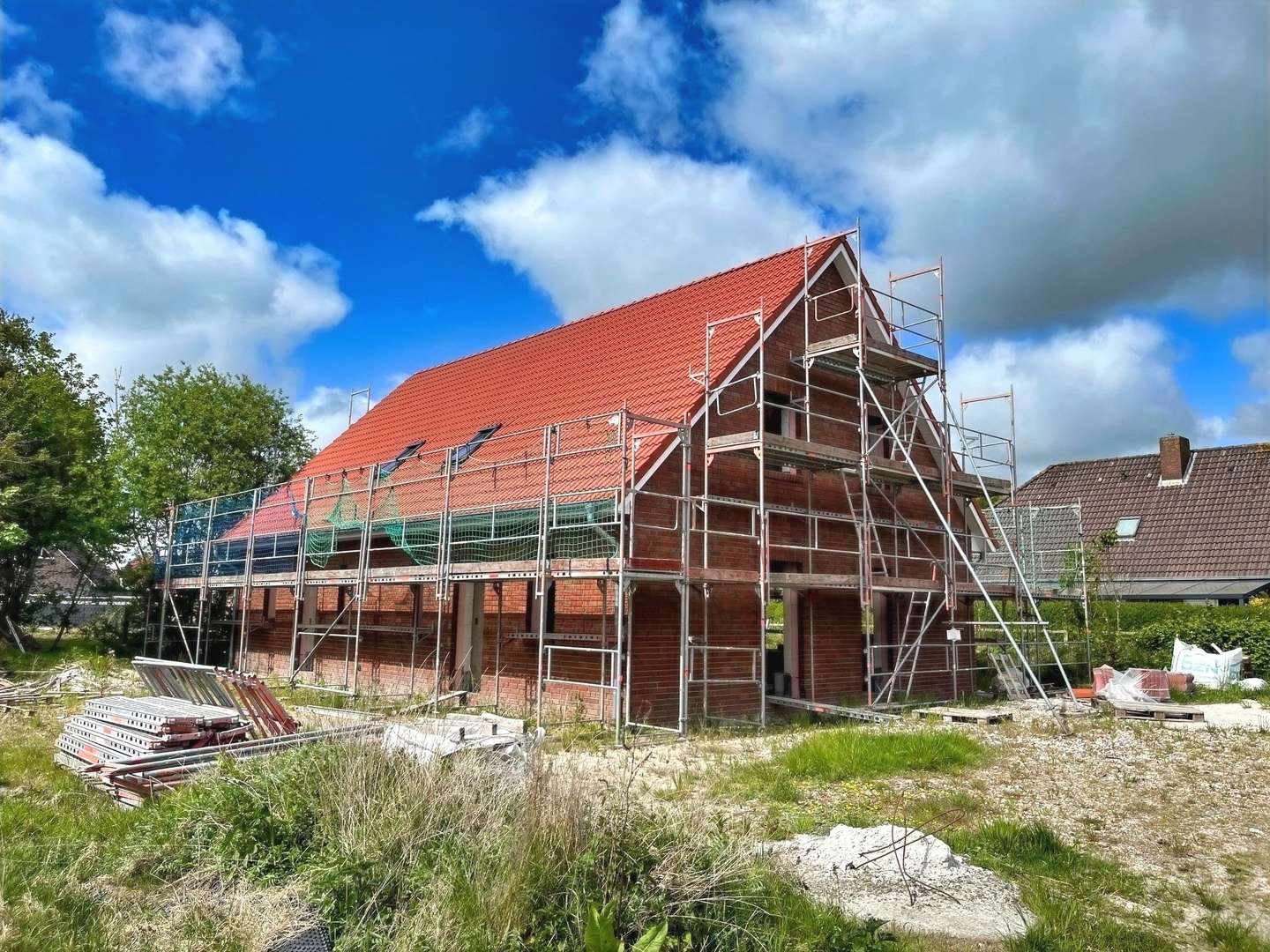 Seitenansicht - Zweifamilienhaus in 26736 Krummhörn mit 215m² kaufen