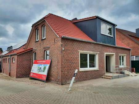 Frontansicht Frontansicht - Erdgeschosswohnung in 26632 Ihlow mit 62m² kaufen