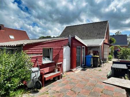 Gartenansicht Gartenansicht - Einfamilienhaus in 26624 Südbrookmerland mit 91m² kaufen