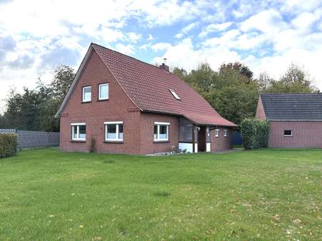 Außenansicht - Einfamilienhaus in 26624 Südbrookmerland mit 130m² kaufen