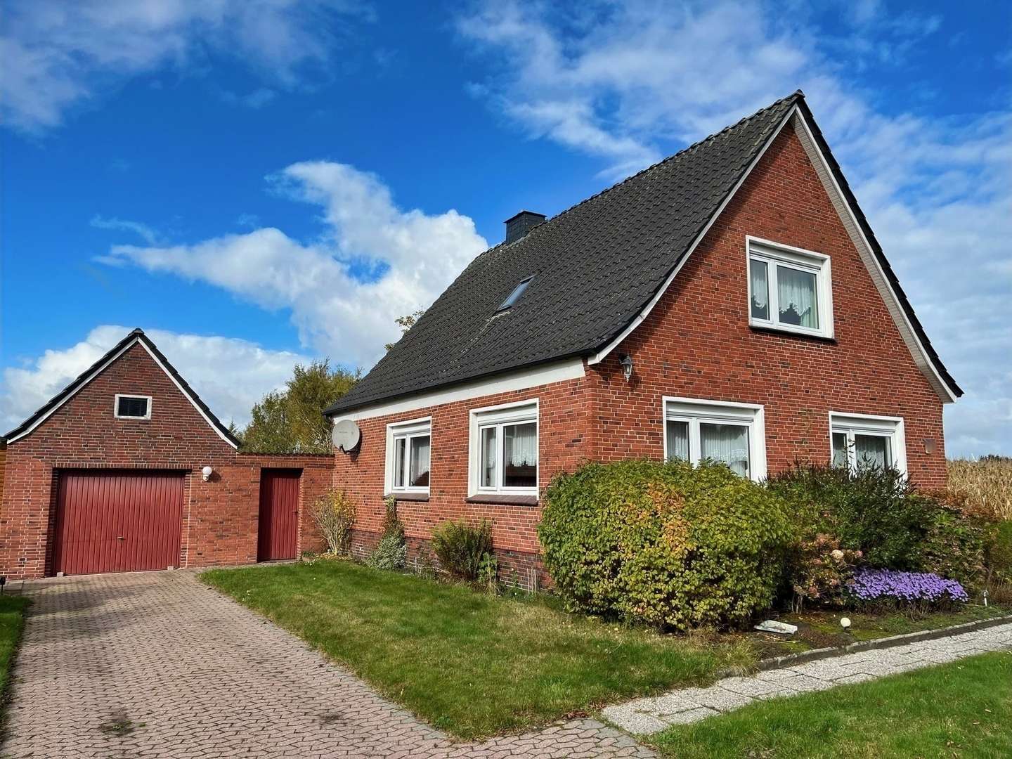 Straßenansicht - Einfamilienhaus in 26605 Aurich mit 110m² kaufen