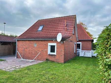 Rückansicht Rückansicht - Einfamilienhaus in 26624 Südbrookmerland mit 125m² kaufen