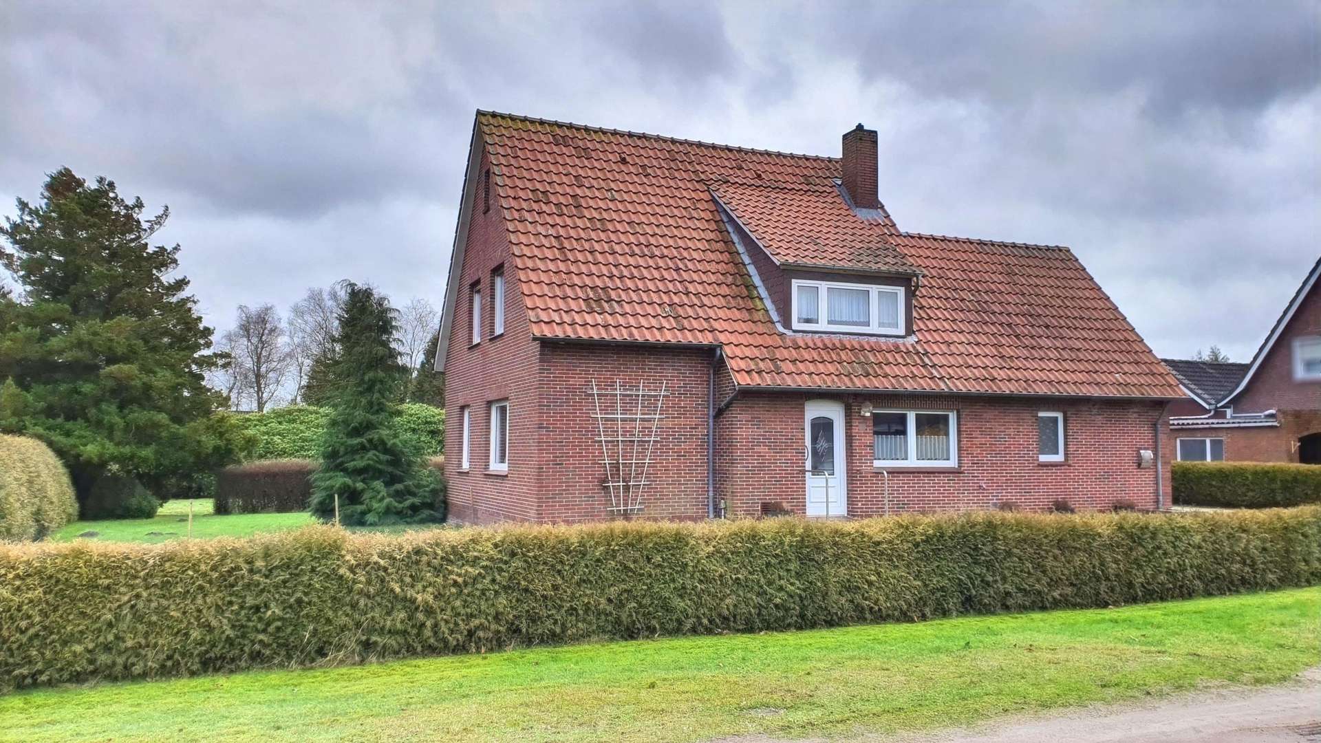 Frontansicht - Einfamilienhaus in 26639 Wiesmoor mit 120m² günstig kaufen