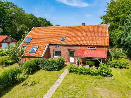 Seitenansicht Straßenseite - Einfamilienhaus in 26629 Großefehn mit 253m² kaufen