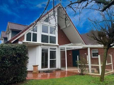 Südansicht - Terrasse - Einfamilienhaus in 26802 Moormerland mit 200m² günstig kaufen