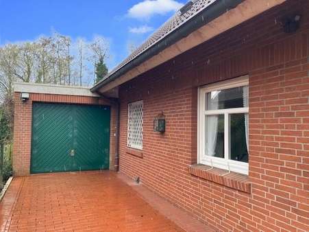 Zuwegung Garage - Einfamilienhaus in 26802 Moormerland mit 200m² günstig kaufen
