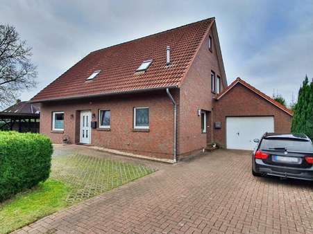 Straßenansicht - Einfamilienhaus in 26607 Aurich mit 153m² kaufen