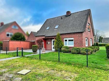 Seitenansicht - Einfamilienhaus in 26607 Aurich mit 110m² kaufen