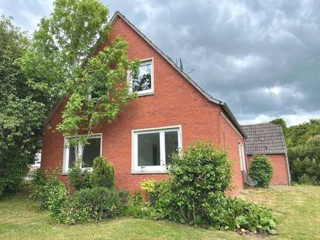 Gartenansicht Gartenansicht - Einfamilienhaus in 26736 Krummhörn mit 85m² kaufen